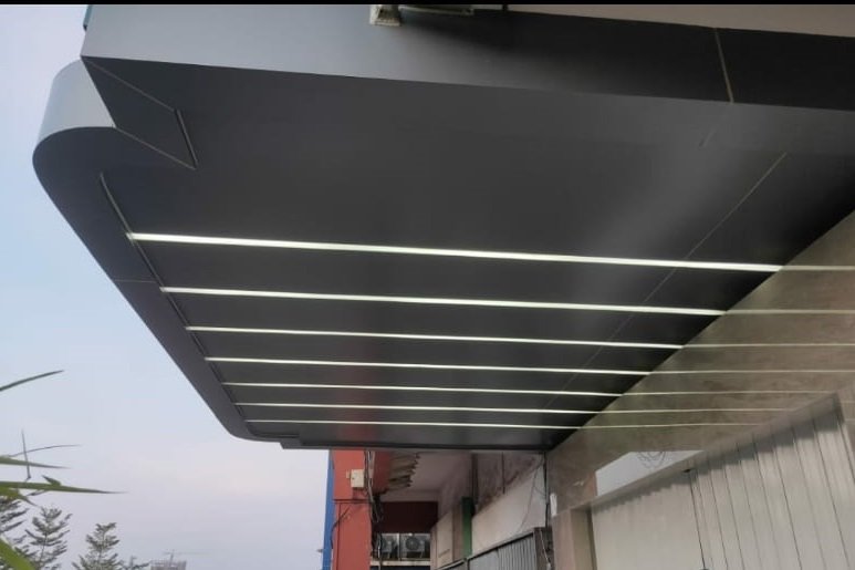 Kanopi depan dengan lampu LED strip di kantor Pegadaian Cabang Sei Panas Batam